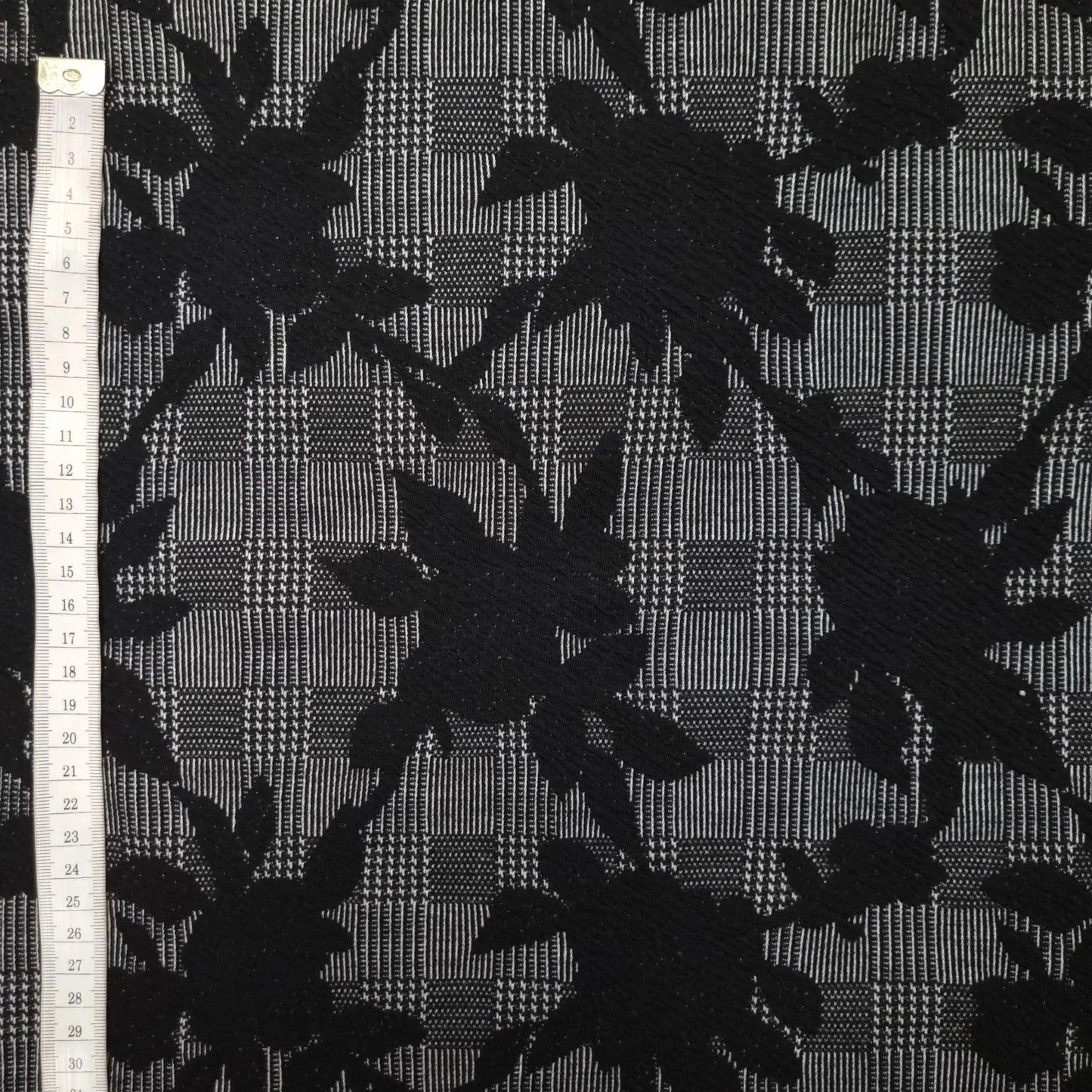 Polyesterstoff mit Glencheck und Blumen