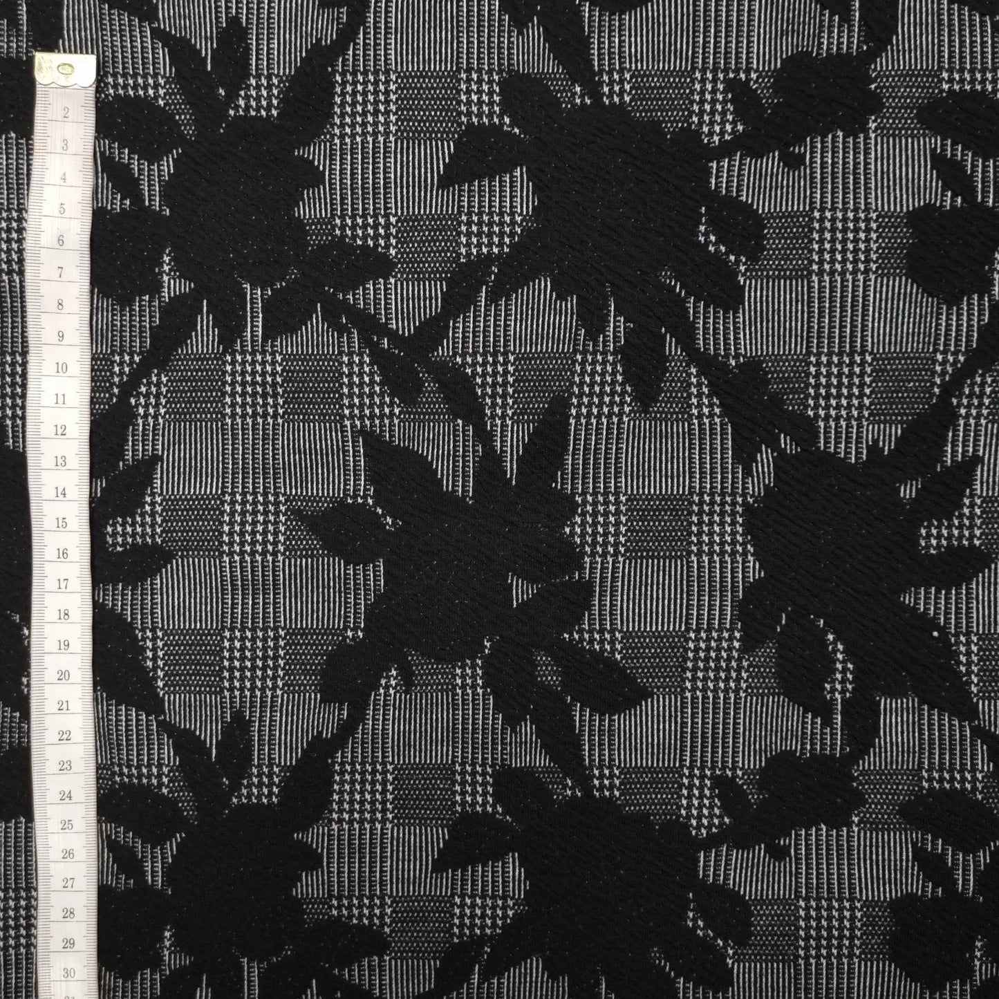 Polyesterstoff mit Glencheck und Blumen