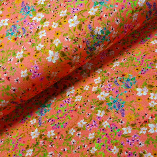 Viskosejersey mit Blumen Lachsfarbe CSM-STOFFE