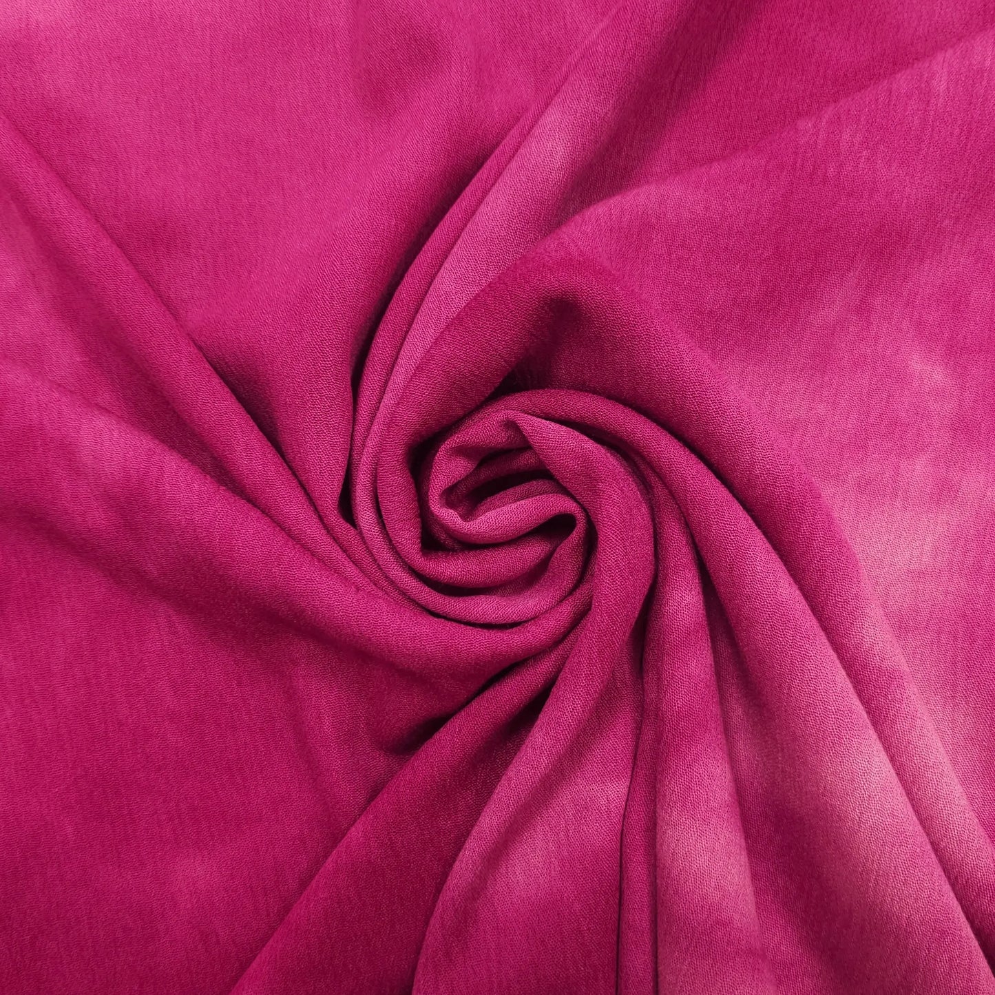Viskosekrepp pink mit Batik Motiv CSM-STOFFE