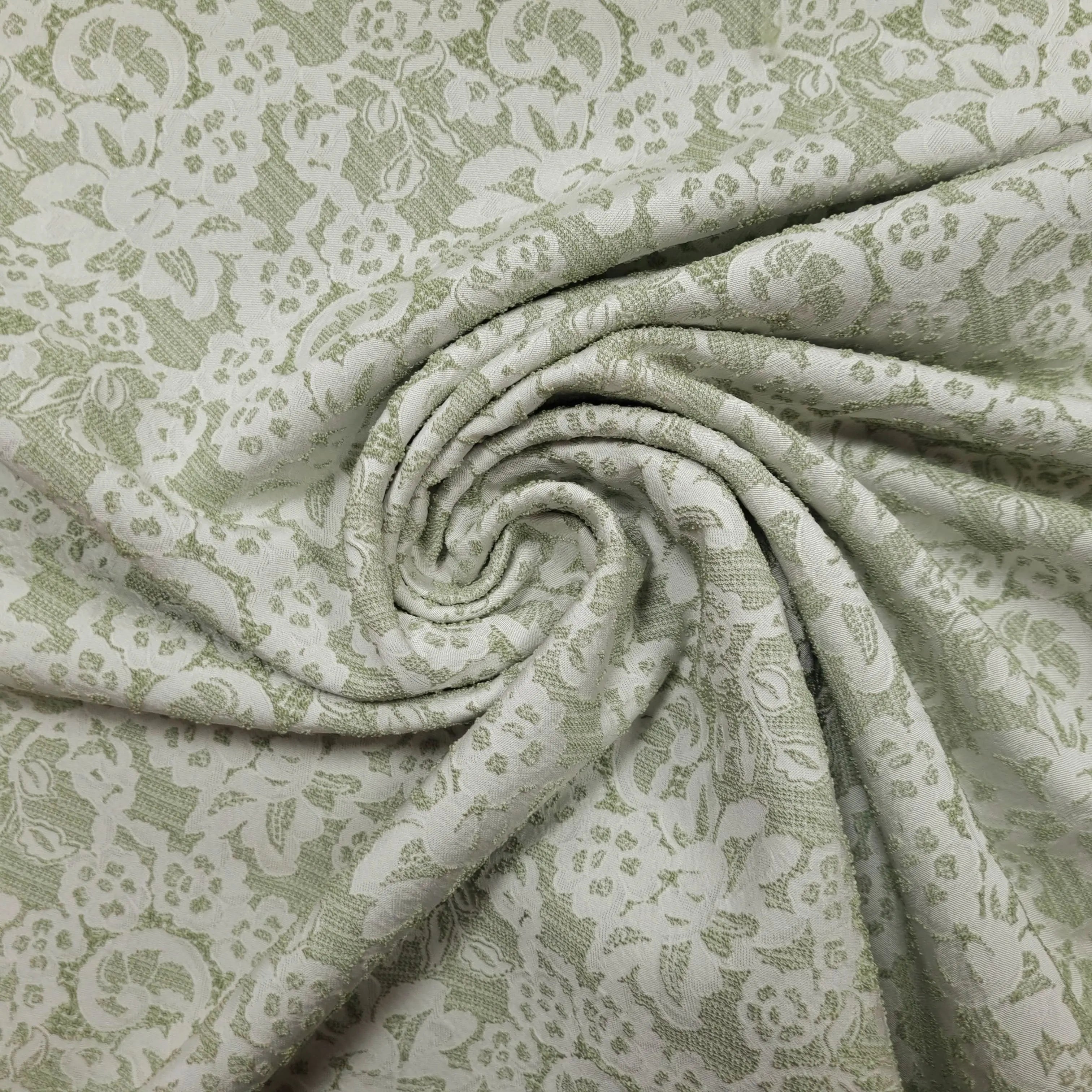 Jacquard gruen mit Blumenmuster