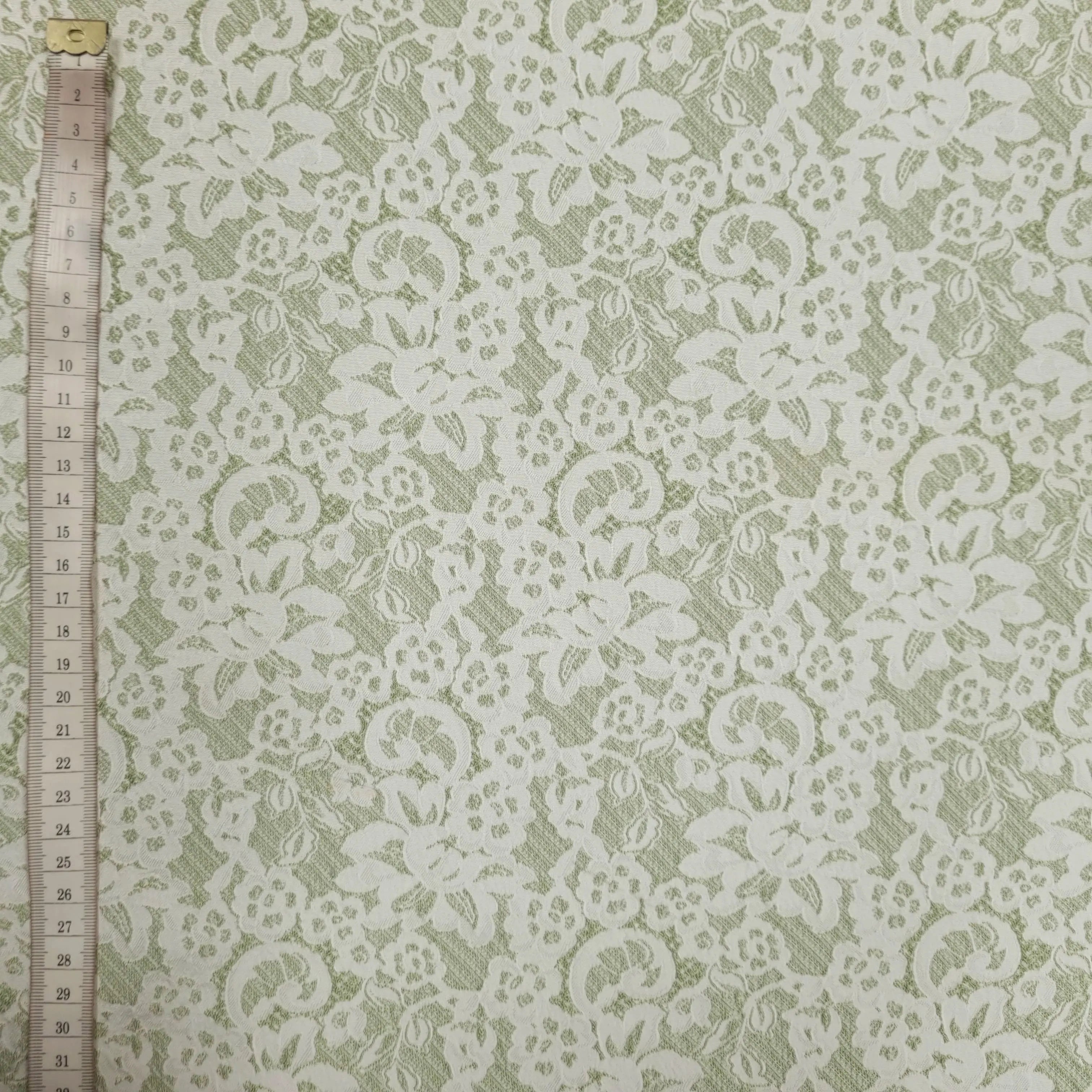 Jacquard gruen mit Blumenmuster