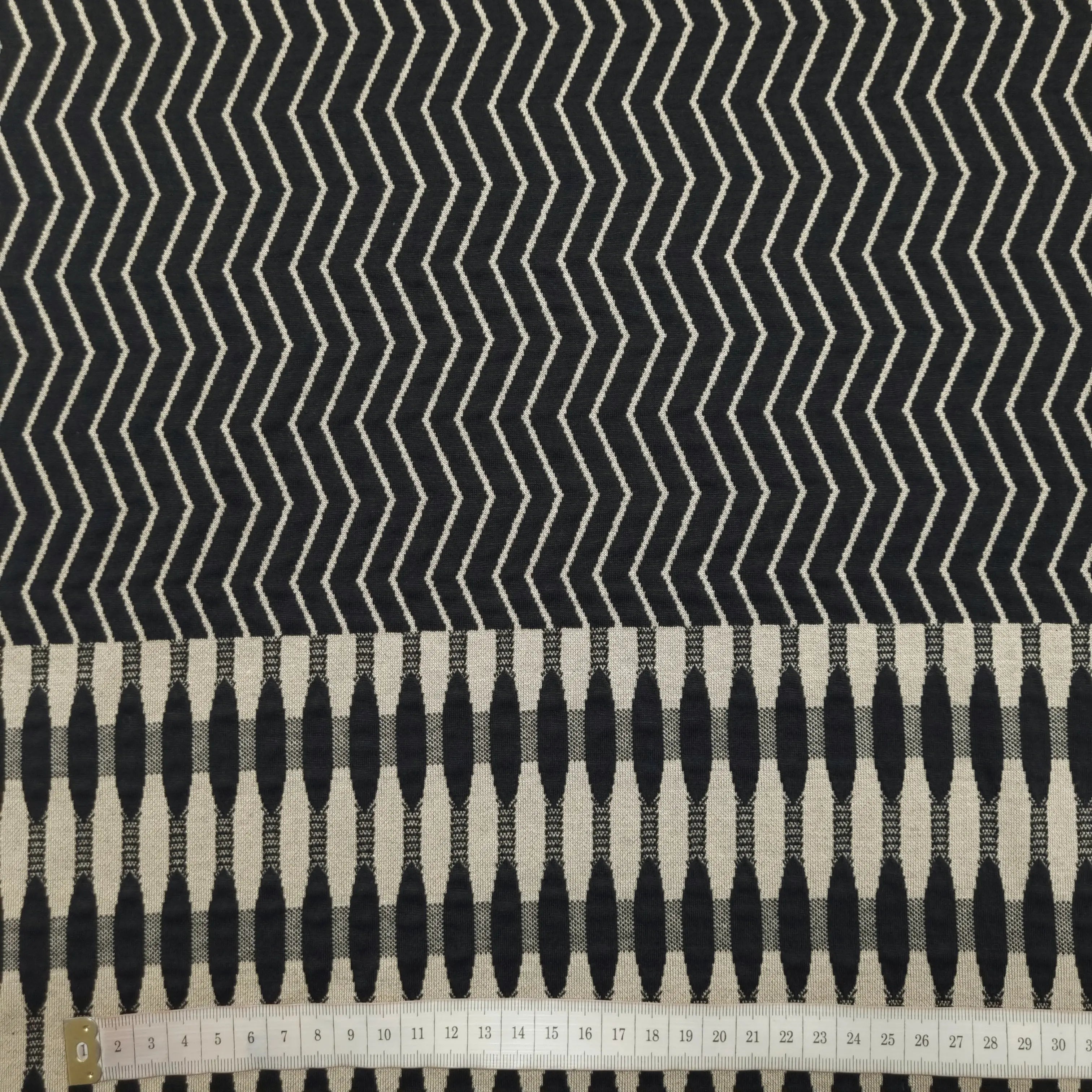 Jacquardjersey schwarz beige (Rapport 90 cm) CSM-STOFFE