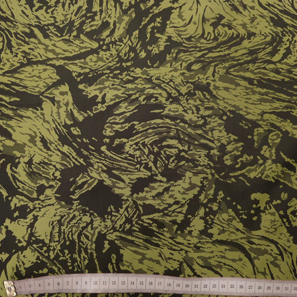 Polyesterstoff grün/schwarz | abstraktes Muster CSM-STOFFE