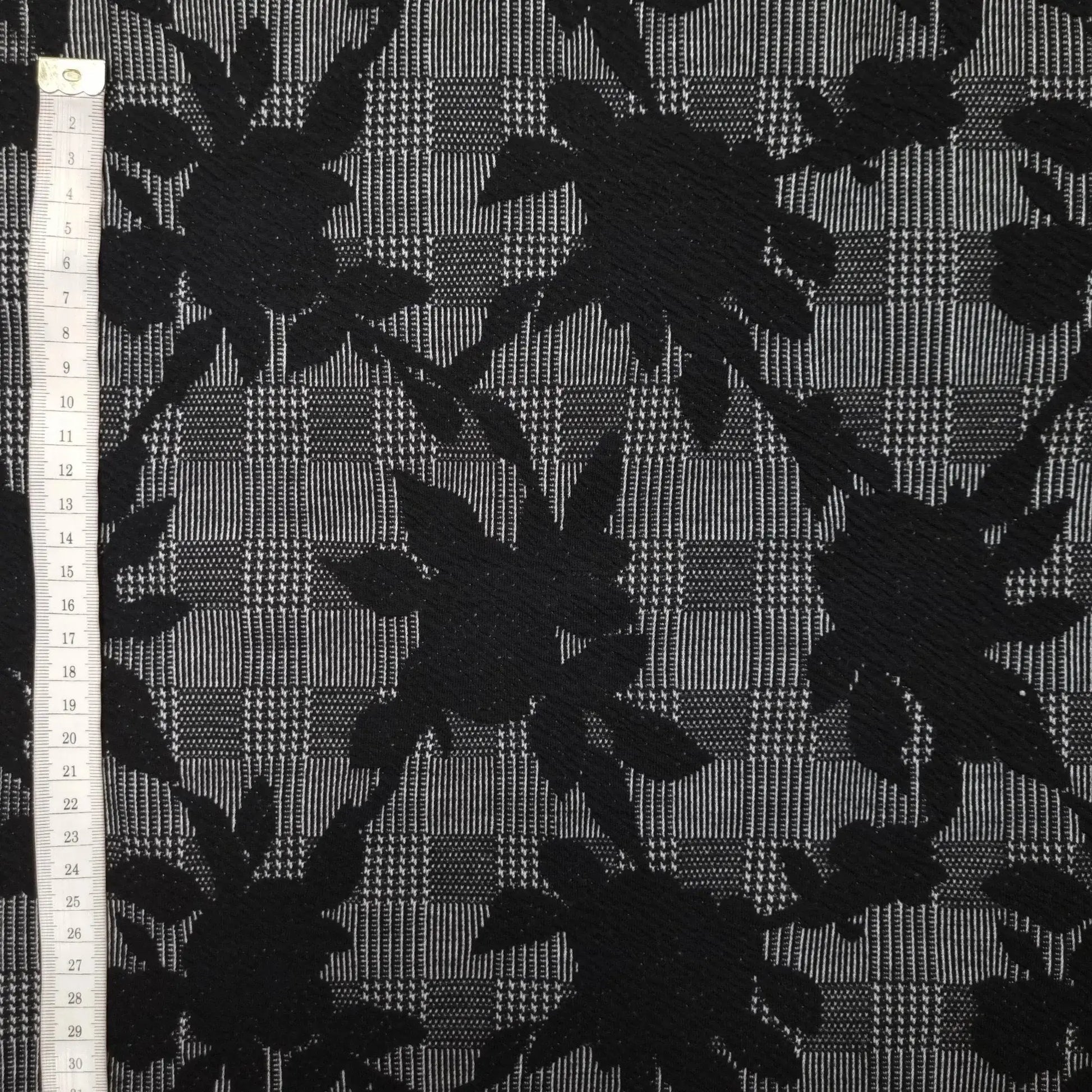 Polyesterstoff mit Glencheck und Blumen