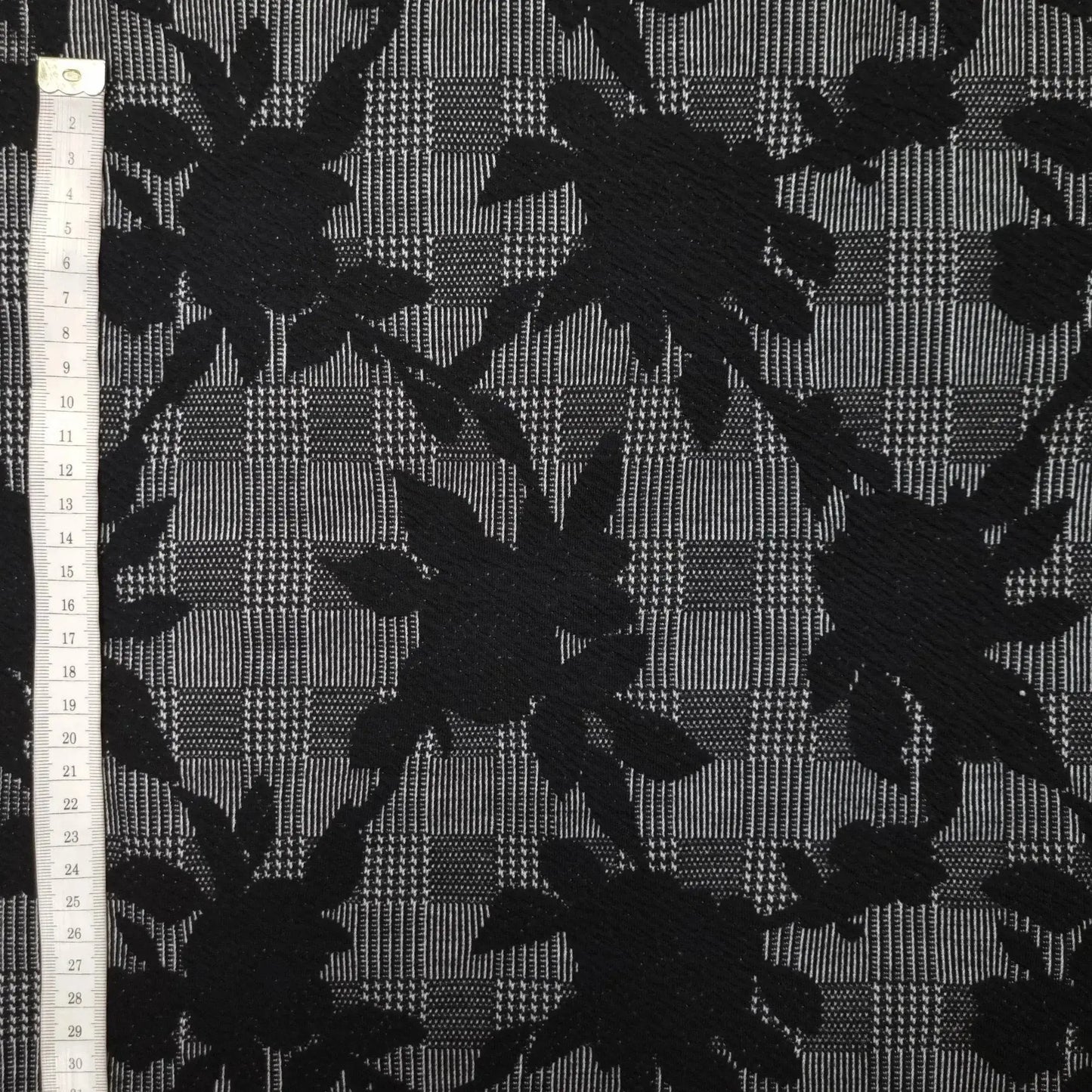 Polyesterstoff mit Glencheck und Blumen