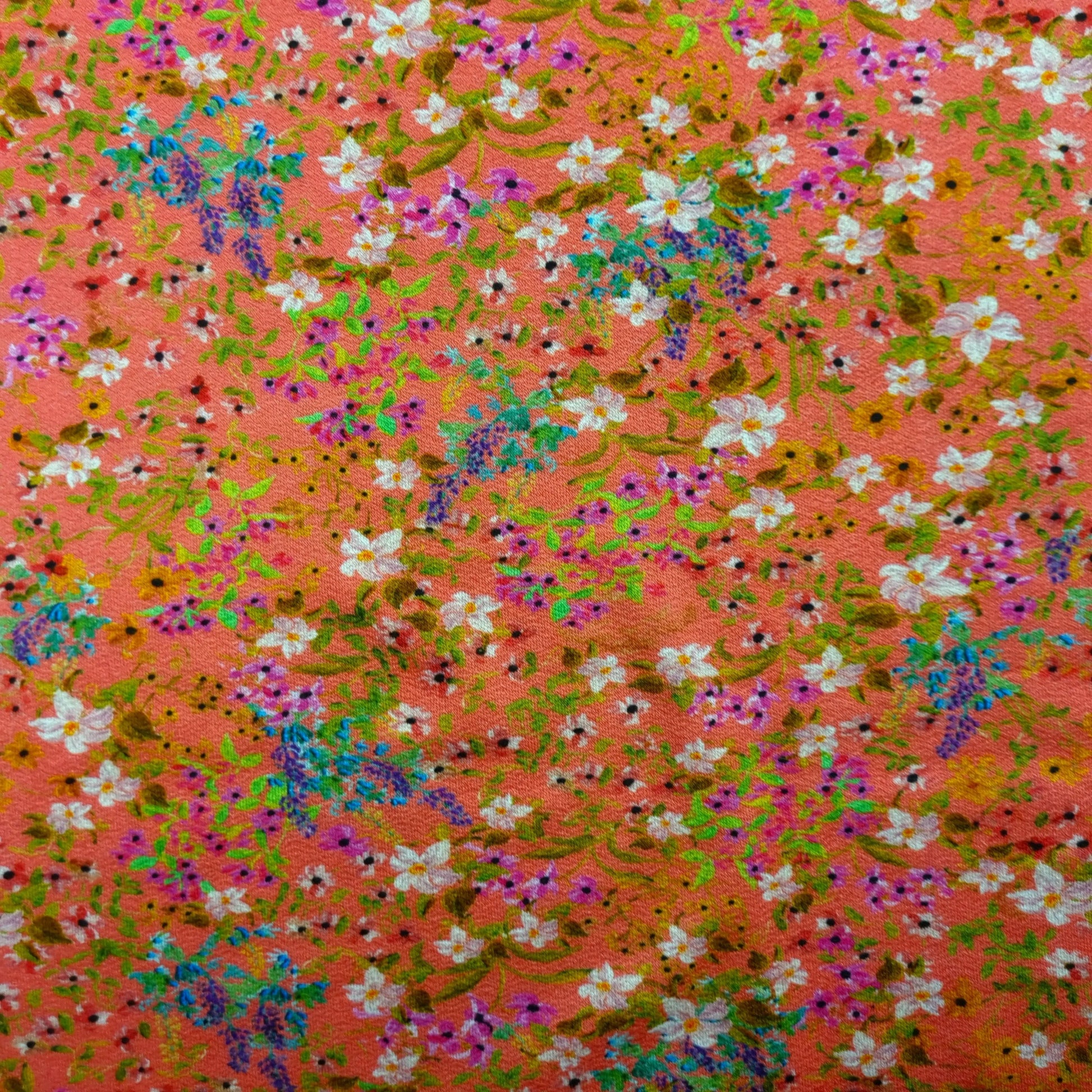 Viskosejersey mit Blumen Lachsfarbe CSM-STOFFE
