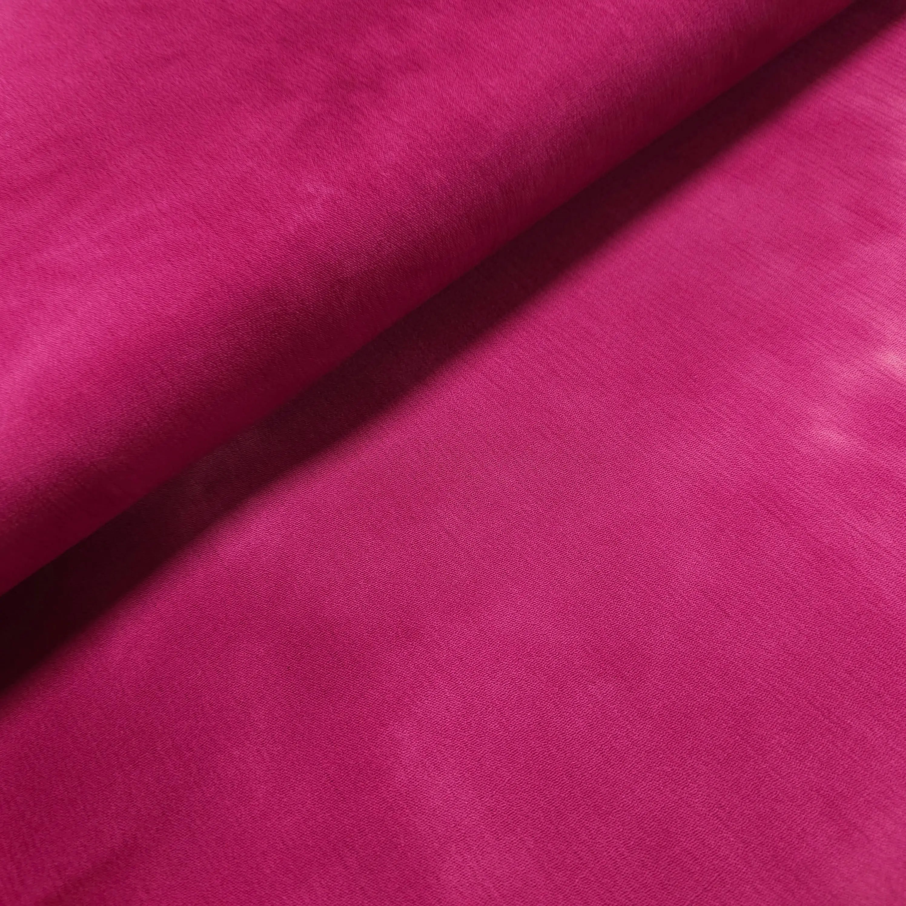 Viskosekrepp pink mit Batik Motiv CSM-STOFFE