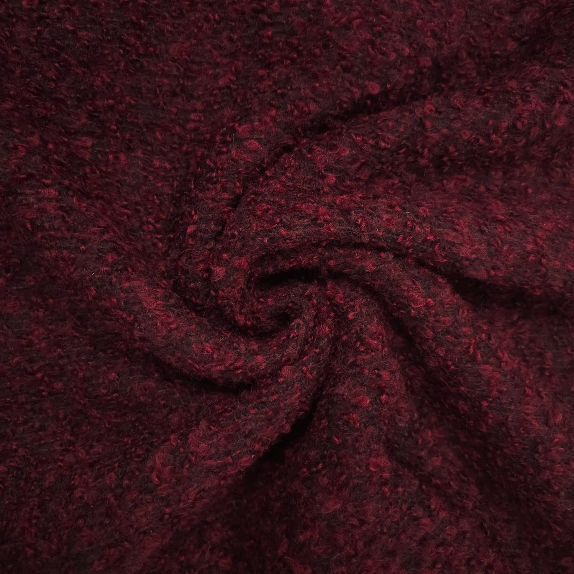Wollbouclé schwarz/bordeaux CSM-STOFFE